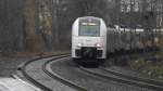 Die 460 014-4 der Trans Regio mit dem MRB 26 nach Remagen bei der Ausfahrt aus 
Bonn HBF ( Rauen entstand weil es Geregnet hat) , DEN 15.01.2015