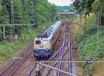 110 223 und ihren RE nach Stuttgart trennten am 18.7.00 nur noch 600 Meter vom Bahnhof Crailsheim. (Scan vom Farbnegativ)
