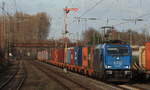 Am 04.02.2021 zog LTE 186 942 einen Containerzug richtung Hilden durch Düsseldorf-Rath.