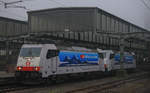 Am 09.01.2021 fuhr die neu beklebte BLS Cargo 186 909`Olimpino´ mit 186 901`Oxen´ im schlepp von Krefeld Hbf nach Freiburg(Breisgau), hier fahren die Beiden aus dem Hauptbahnhof von Duisburg aus. 
