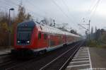 RE (RE 21016) von Hamburg Hbf nach Kiel Hbf in Elmshorn. Geschoben hatte die 112 178-9 [Verl.AK|14.04.12]. 08.11.2011