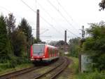 422 509 kam am 19.9 als S3 nach Oberhausen in Essen Horst durch vorbei an alter Ruhrgebietsarchitektur.