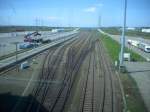 Der Fhrhafen Sassnitz-Mukran am 03.05.2008.Aufgenommen von der Fussgngerbrcke.Leider mute ich durch die Glasscheiben der Fussgngerbrcke fotografieren.Ganz Links im Hintergrund (das Rote) stehen