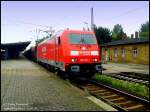 185 296 vor einem Kohlezug der DB AG im Bahnhof Falkenberg/ELster in Richtung Dessau.