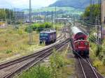 Hbf Freiburg mit BB 1042 520-5 (Eisenbahn Kurier)und eine rangierende Kf am 20.August 2007