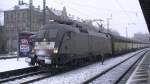 ES 64 U2 - 029 der TX Logistik durchfhrt am 21.01.2012 mit einem ARS Altmann Autotransportzug den Bahnhof Frth Hbf in Richtung Nrnberg.