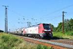 159 226 von EBS kommt mit einem Staubgutwagenzug aus Richtung Weißenfels in Großkorbetha eingefahren.