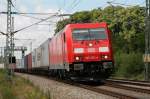 185 370 klappert mit ihrem Containerzug durch Hagenow. 17.06.2009