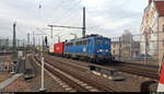 Handy-Aufnahme eines Containerzuges mit 140 831-9 (140 037-1) der Eisenbahn-Bau- und Betriebsgesellschaft Pressnitztalbahn mbH (PRESS), der den Interimsbahnsteig Halle(Saale)Hbf Gl.