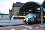 Zwei 9442 (Bombardier Talent 2) von Abellio Rail Mitteldeutschland als RE 74730 (RE19) von Bitterfeld nach Leinefelde treffen auf den mit Werbung beklebten 9442 112 und einen weiteren 9442 als RB