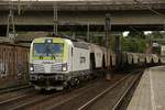 193 892-7 Captrain mit einem Getreidezug in Hamburg Harburg, am 02.09.2017.