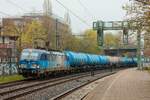 CD Cargo 383 015-5 mit CD Cargo-Kesselzug in Hamburg Harburg, April 2026.
