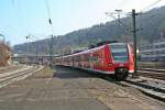 425 312-6 als RE 19042 von Rottweil nach Stuttgart Hbf am Mittag des 06.03.14 beim Verlassen des Bahnhofs Horb am Neckar.