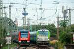 193 436 mit Flixtrain & links DB 620 030 in K�ln Messe/Deutz, August 2026.