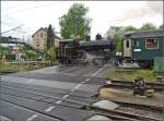 Kohle und Dampf gibt es zu verzollen, die Fahrgste fahren sowieso gleich wieder mit dem Dampfschiff Hohentwiel zurck nach Konstanz. Ec 3/5 der MThB beim Grenzbertritt am 2. Mai. Fotostandort ist an der Strae.