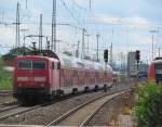 111 225-9 schiebt am 15. Juli 2012 einen RE nach Nrnberg Hbf aus Lichtenfels heraus.