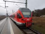 Auf dem RE 13011 Rostock-Sassnitz mußte der 429 026,am 11.Januar 2015,in Lietzow warten dann ging es als RE 13167 nach Binz.