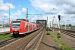 425 220-1 als S4 nach Bruchsal am Mittag des 24.05.14 bei der Einfahrt in Ludwigshafen (Rhein) Mitte.