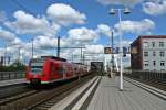 425 218-5 und 425 709-3 als S1 nach Kaiserslautern Hbf am Nachmittag des 24.05.14 bei der Einfahrt in Ludwigshafen (Rhein) Mitte.