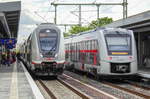 IC 2431 nach Cottbus neben VT 1648 438 als RB 41 nach Aschersleben in Magdeburg Hbf, 05.06.2020.