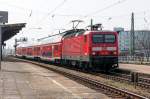 Die Trierer 143 910 mit dem RE13 (RE 17691) von Magdeburg Hbf nach Leipzig Hbf, bei der Ausfahrt aus Magdeburg-Neustadt. 24.04.2015