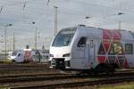 2 neue Süwex-FLIRTs von DB Regio stehen am Mittag des 24.12.14 im Gleisvorfeld des Manheimer Hbfs.