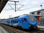 Der Elektrotriebzug ET 4.38A wartete Ende November 2023 am Hauptbahnhof von Memmingen auf die Weiterfahrt.