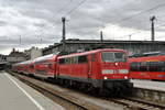 111 214 stand am 4. März 2019 abfahrbereit mit einem RE nach Nürnberg in München Hbf.