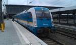 183 003 der Vogtlandbahn / ALEX (Arriva Lnderbahn Express) steht am 03.07.2012 mit einem ALEX in Mnchen Hbf. Zugziel ist Hof Hbf. 