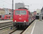 111 024-6  ADAC  steht am 05. September 2012 mit einem RE nach Mittenwald im Mnchener Hbf.