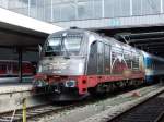183 001 steht am 10.08.2013 mit dem Alex 84112 nach Hof im Mnchner Hauptbahnhof bereit.