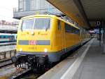 Am 24.06.14 wendet 111 059 mit einem Messzug am Münchner Hauptbahnhof.