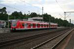 423 330-0 auf dem Weg nach Frankfurt am Abend des 20.06.14 beim Halt im Bahnhof Neu-Isenburg.