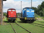 WFL Lok Nr.8 und die LEAG 293 505 neben dem Stellwerk in Neustrelitz Süd am 21.August 2021.