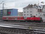 214 018-4 rangiert am 20. Februar 2013 mit einem Karlsruher Steuerwagen (82-34 280 Bnrdzf 463.1) un Nrnberg-Drrenhof.