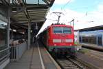 111 064 am 21.06.2013 mit dem RE 26512 von Basel Bad Bf nach Offenburg.