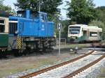 Bahnhof Putbus,am 24.August 2013,mit dem ausfahrenden PRESS VT650 032 nach Bergen/Rgen und 251 901 als Schlulok im P102 nach Lauterbach Mole.