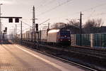 185 174-0 DB Cargo mit dem Mega Kombi in Rathenow und fuhr weiter in Richtung Wustermark. 03.03.2018