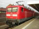 Der RE 2 in Rathenow mit der Elok 112 122 09.04.2011