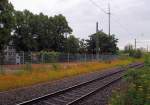 Hinter dem Zaun, stand bis vor nicht all zu langer Zeit das Empfangsgebude des Bahnhof Rheydt Odenkirchen.....Der Rest den der zweite Weltkrieg berig gelassen hatte, nun hat die Bahn AG ihn auch entsorgt......gut das ich ihn noch fotografiert habe. 16.7.2012