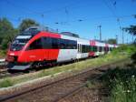 BR 4024 096-2 der BB bei der sdlichen Einfahrt in den Bahnhof Rosenheim.