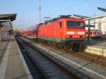 642-051 als RB 33369 nach Graal-Mritz und 114 005 mit einer -noch verschlossenen- RE5 Garnitur nach Lutherstdt. Wittenberg in Rostock Hbf. 31.12.2008