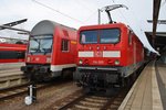 RE18491  Warnemünde-Express  von Warnemünde nach Berlin Lichtenberg mit 112 118 trifft am 4.9.2016 im Rostocker Hauptbahnhof auf 114 005 mit einem RE5 (RE4367) nach Wünsdorf-Waldstadt.