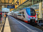 Ex ÖBB ET 6442 908 der DB steht in Stuttgart Hbf mit dem MEX 17 nach Pforzheim Hbf, 22.04.2026.
