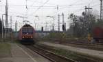 482 001-5 bei einer Fahrt durchs  Grüne  mit einem kurzen Kesselwagenzug in Torgau.
15.11.2014 11:06 Uhr.