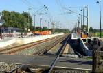 Umbau Bahnhof Vhrum, Bahnbergang, im Bau befindliche Bahnsteige am Bahnhof Vrum