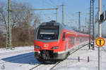 Der Elektrotriebzug 1428 514 hier im Februar 2021 bei der Einfahrt am Hauptbahnhof Wanne-Eickel.