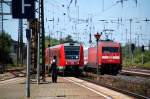 Whrend am 13.06.09 612 035 einfhrt, fhrt 101 077 mit IC 2150 aus Weimar aus.