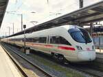 411 083 (Oberursel) am Schluss des ICE 27 Dortmund - Passau - Wien in Würzburg, 01.04.2025