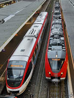 Die Triebzüge 1008-2 & 1440 803-3 im Februar 2021 beim Halt am Hauptbahnhof Wuppertal.